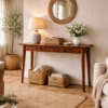 Solid wood console table styled in a country cottage living room with exposed beams