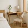 Scandinavian bedroom corner with a wooden Nordic writing desk beside a window, styled with a lamp, plant, and chair next to a minimalist bed.