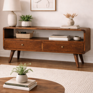 Mid-century style wooden TV console with two drawers, open shelving and tapered legs in a neutral living room