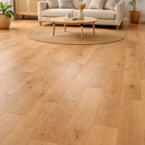 Natural oak engineered wood flooring in a bright modern living room, featuring wide planks with warm tones and visible grain, styled with a neutral sofa, round rug and wooden furniture, with the floor as the main focus.