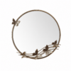 Round wall mirror with decorative metal leaf detailing around the frame, isolated on a clean background for product display.