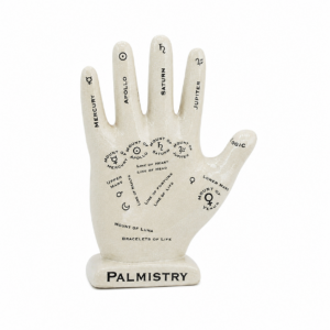 Palmistry hand ornament with printed astrology markings and labelled lines, isolated on a clean background for product display.