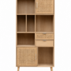 Light wood storage cabinet with open shelving, drawers and rattan panel doors, isolated on a clean background for product display.
